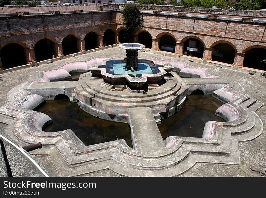 A fountain in a square in Antigua, Guatemala. A fountain in a square in Antigua, Guatemala