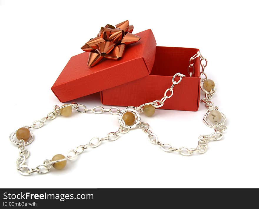 Christmas gift composed by red box and necklace of stones