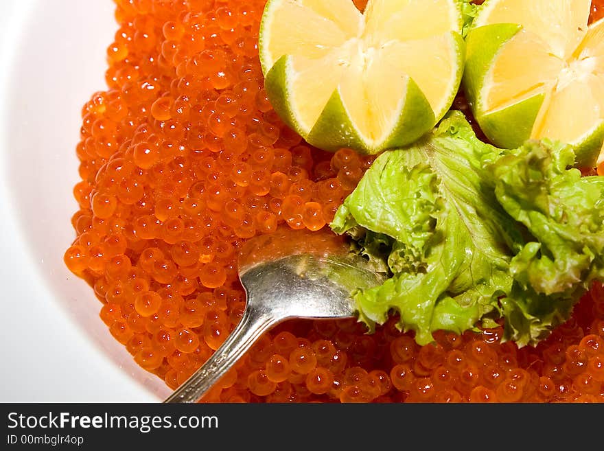 Red caviar with a lemon