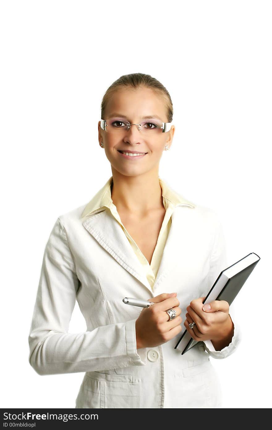 Business portrait of a young and successful woman writing at a folder. Business portrait of a young and successful woman writing at a folder