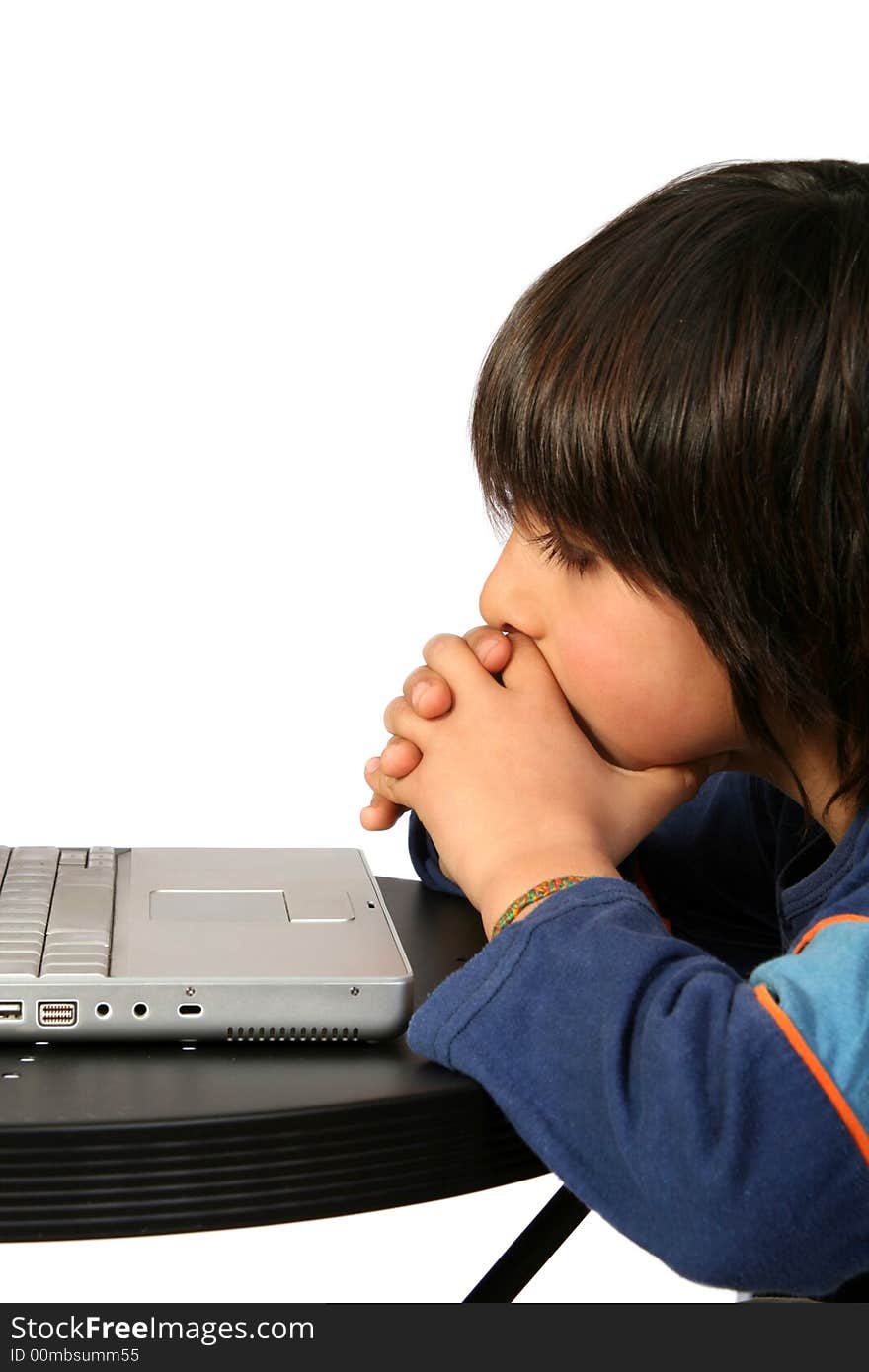 Digital photo of a little boy enjoying the laptop. Digital photo of a little boy enjoying the laptop.