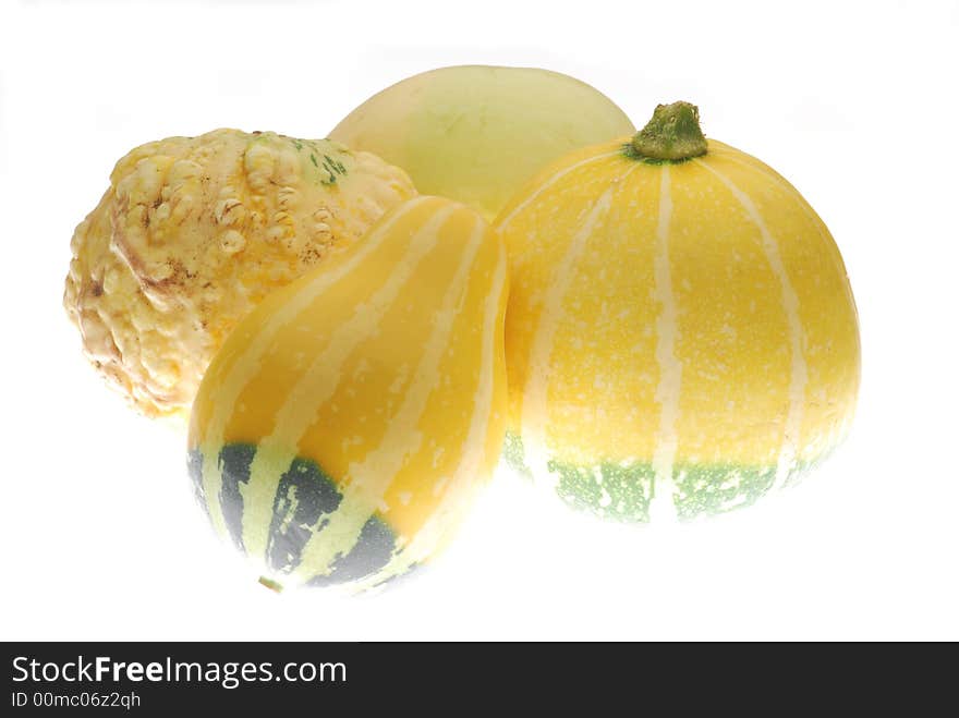 Small yellow pumpkin on white background