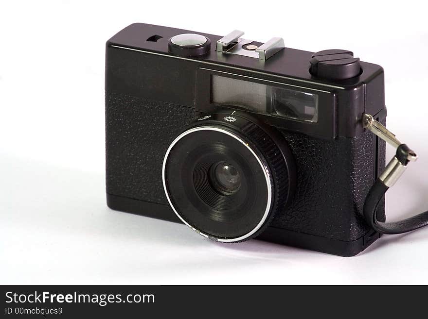 And Old Camera in a white background. And Old Camera in a white background