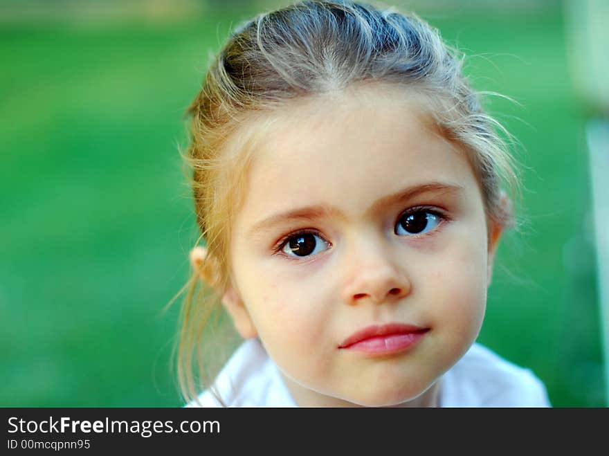 Beautiful young girl subtle face expression. Beautiful young girl subtle face expression