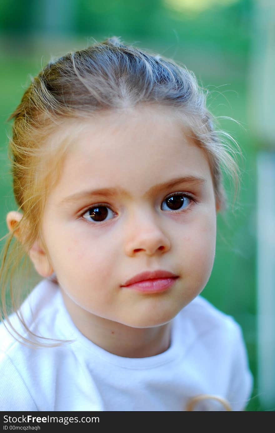 Beautiful young girl with face expression, vertical portrat. Beautiful young girl with face expression, vertical portrat