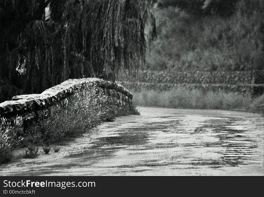 Black and White rainy bridge rain road