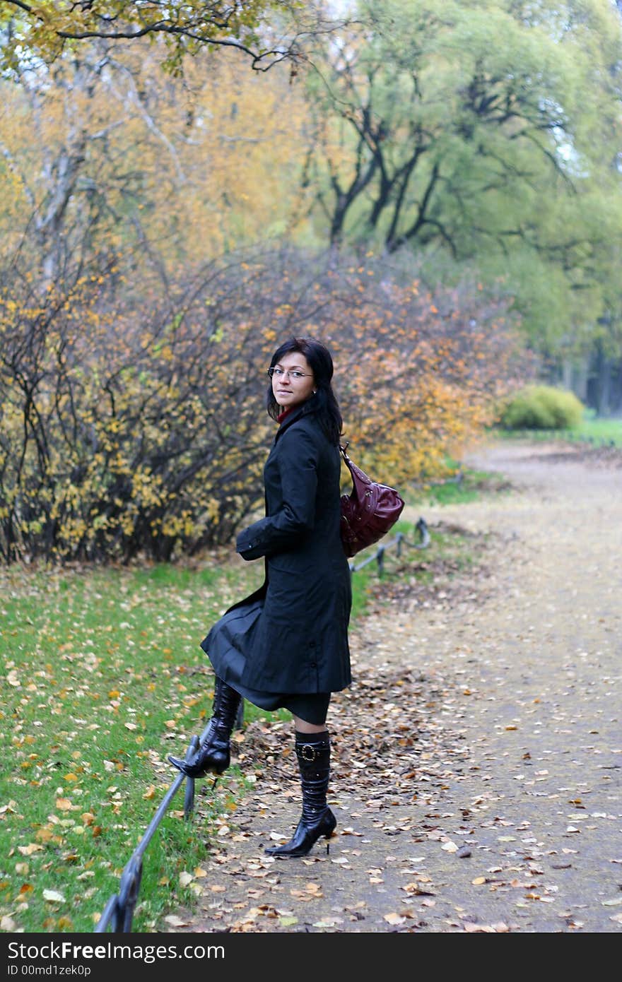 Young woman in a autumn park