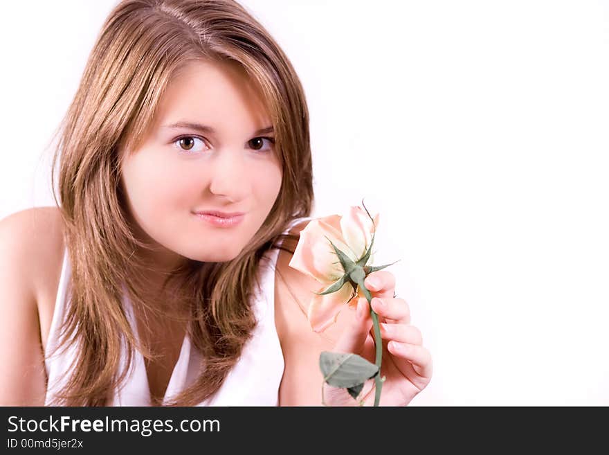 Young girl with flower isolated on white