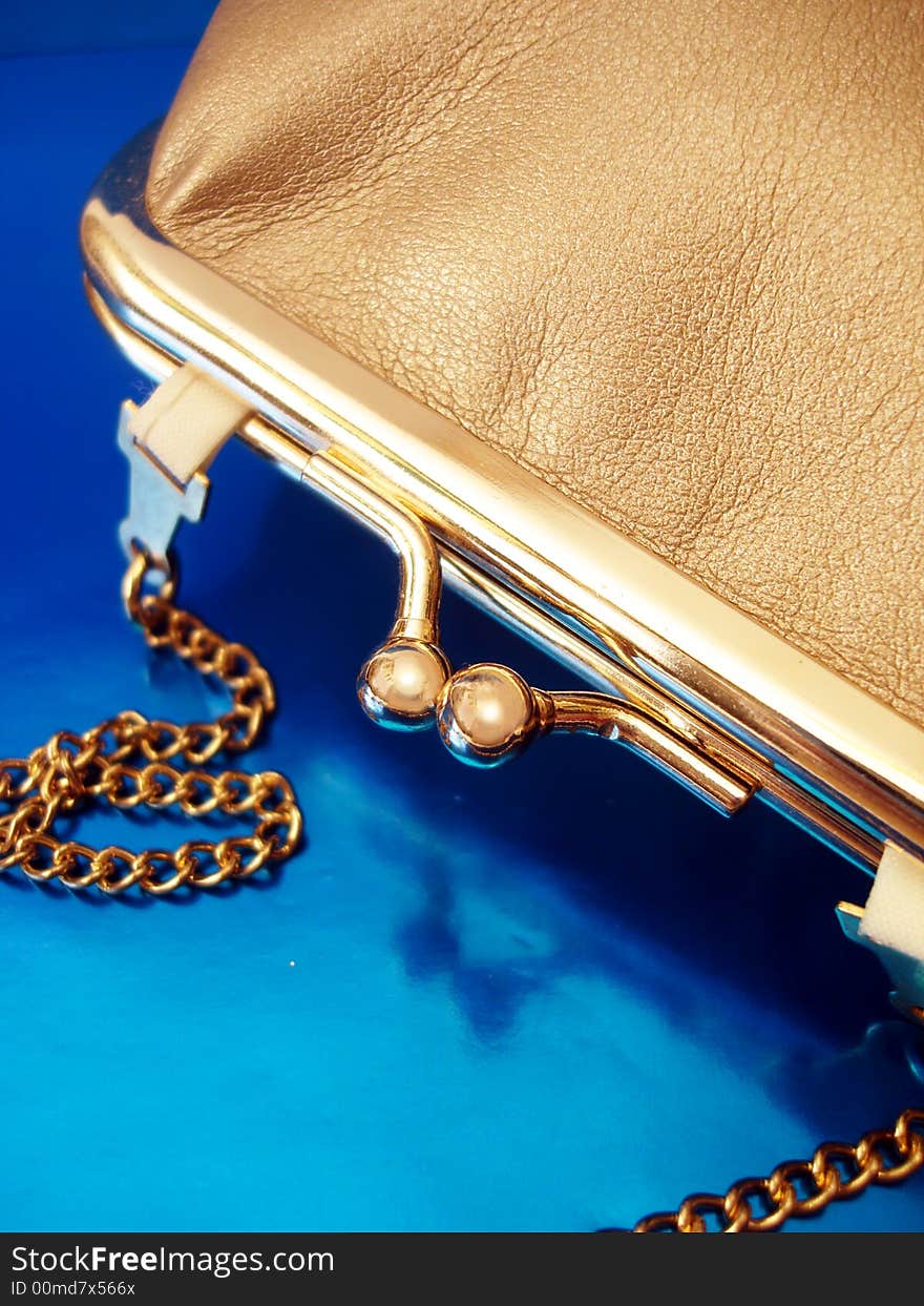 Golden womanish handbag