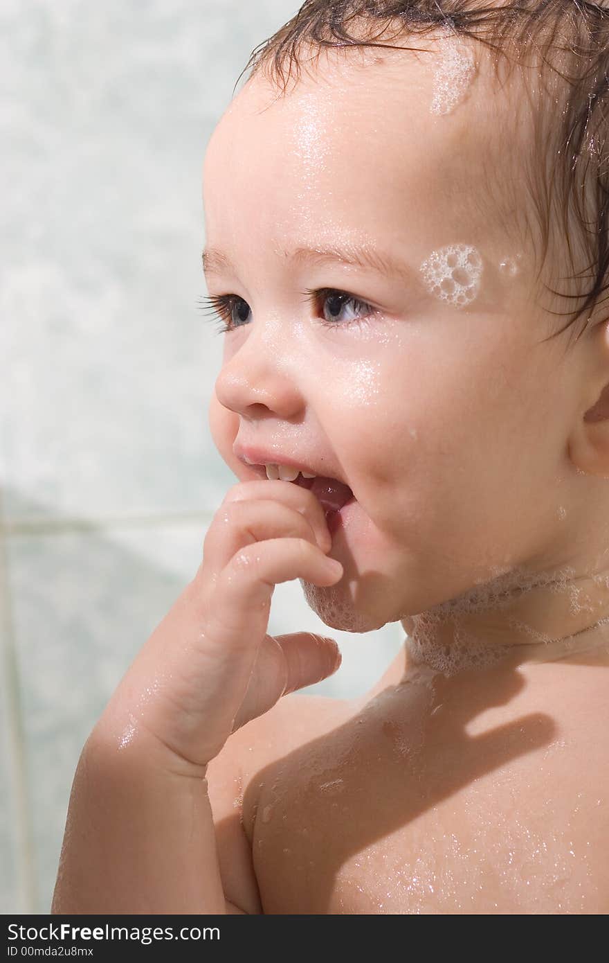 Happy Child is bathing with toys. Happy Child is bathing with toys