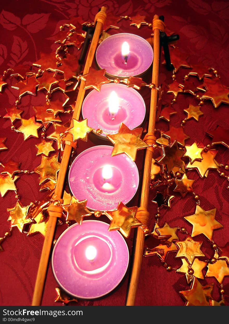 Row Of Pink Candles With Stars