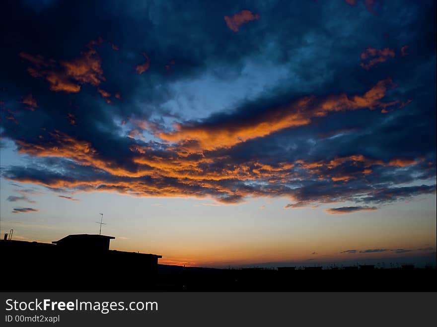 A city in a red sea at the sunset. A city in a red sea at the sunset