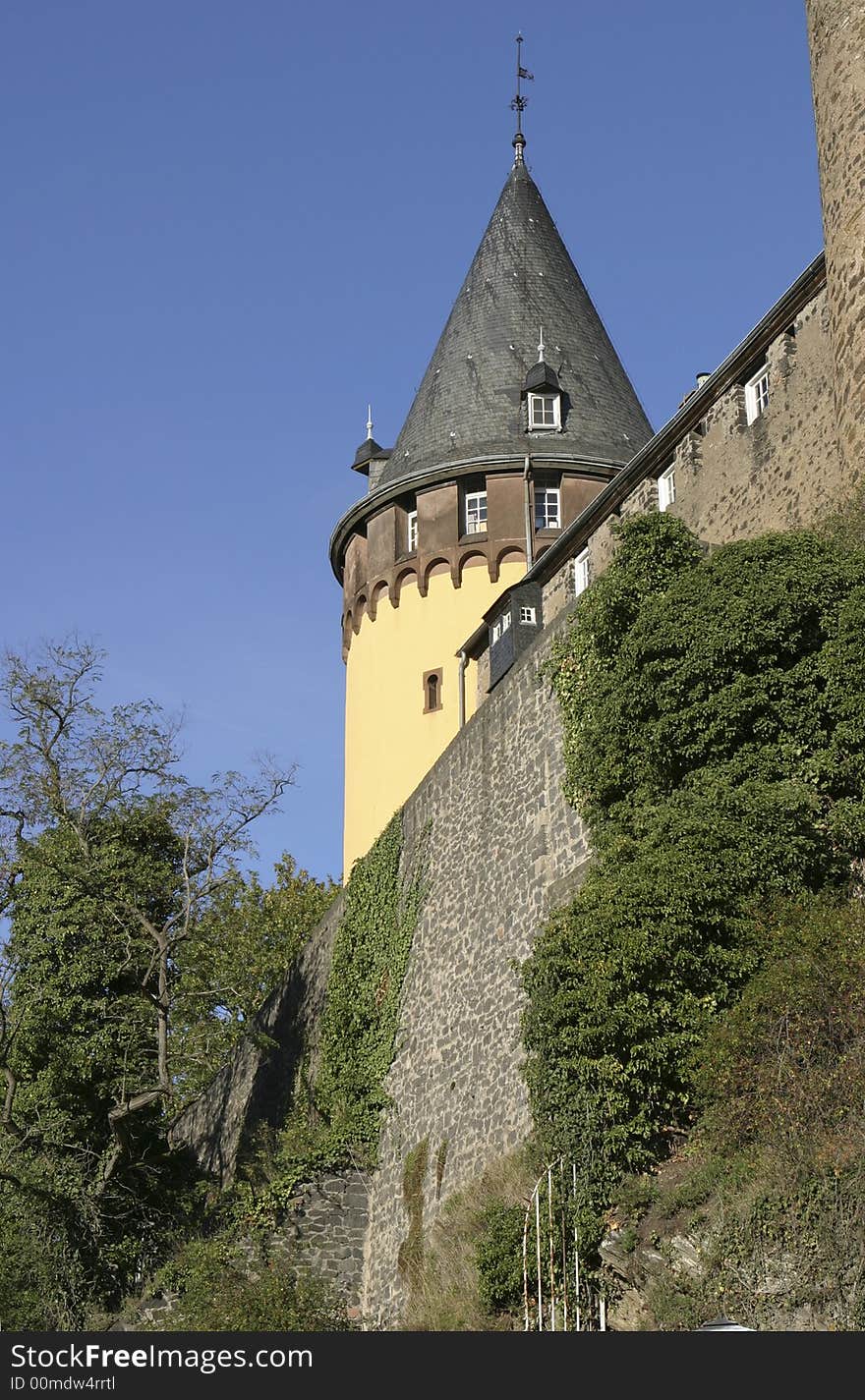 Medieval castle in Germany standing in the bright sunlight of a clear autumn day. Medieval castle in Germany standing in the bright sunlight of a clear autumn day