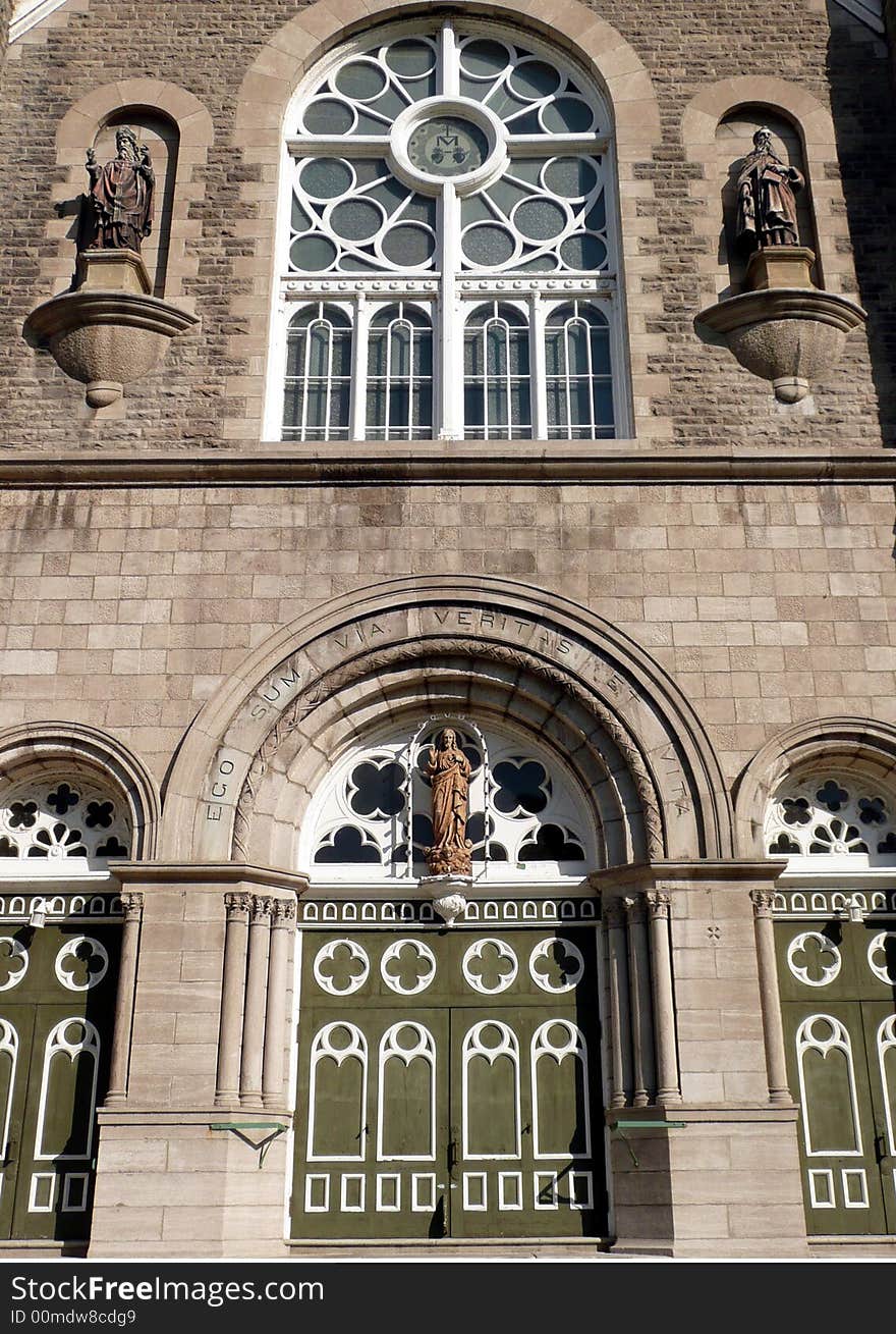 Catholic church entrance upwards view. Catholic church entrance upwards view