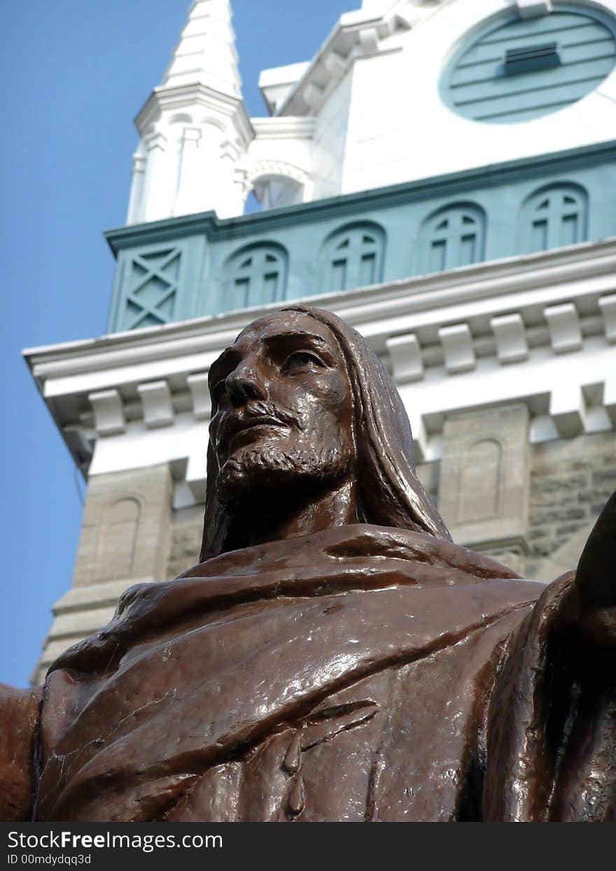 Jesus statue in front of church. Jesus statue in front of church