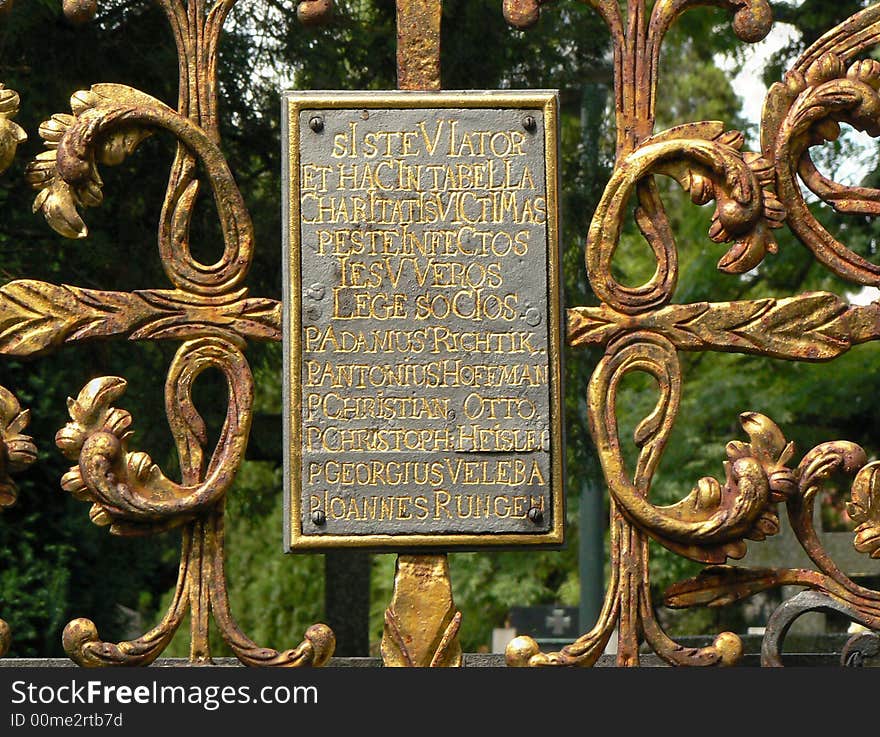 Finely decorated bronze gravestone with a latin epigraph. Finely decorated bronze gravestone with a latin epigraph.