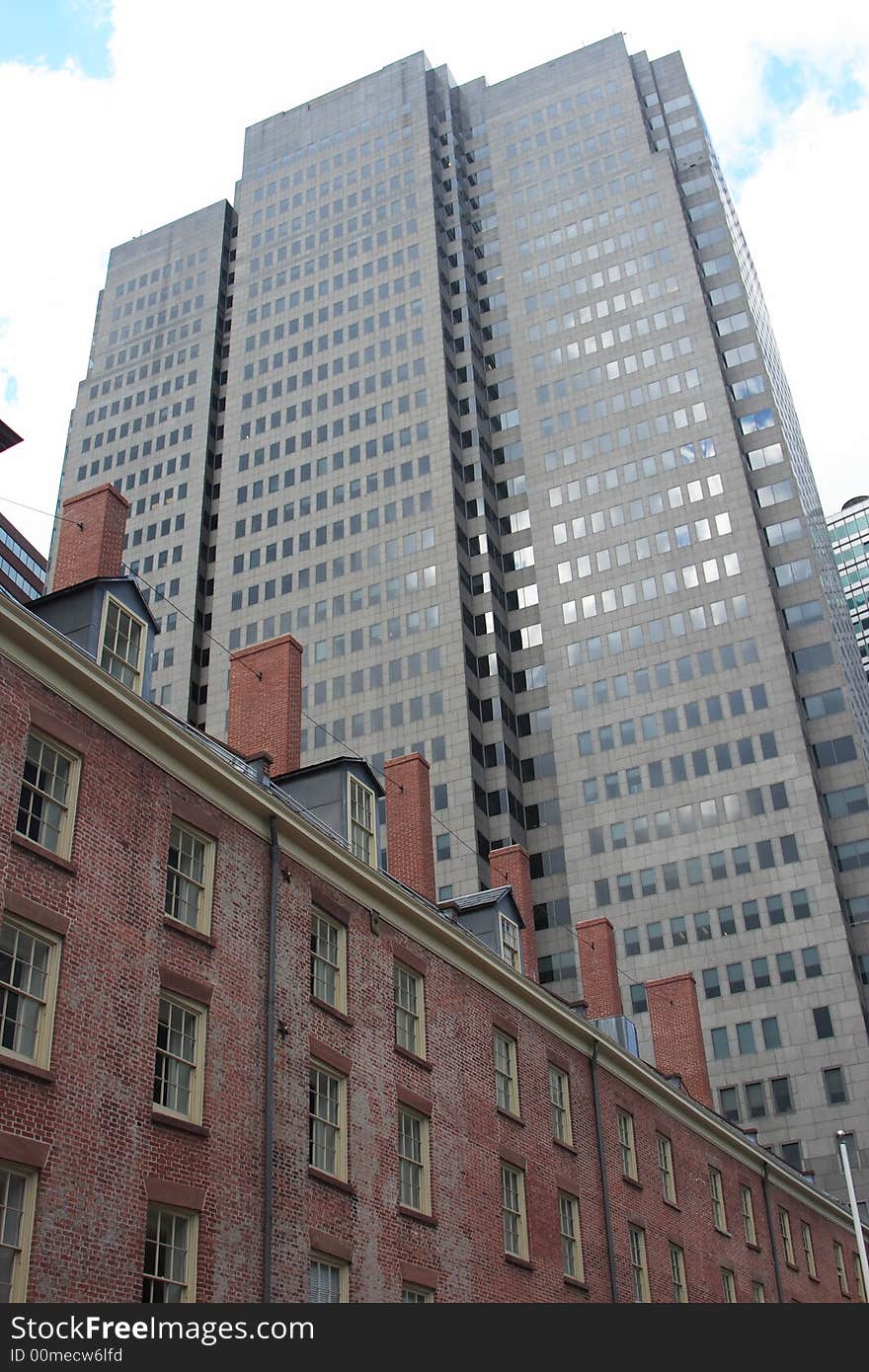 Modern skyscraper and colonial building in downtown New York city. Modern skyscraper and colonial building in downtown New York city