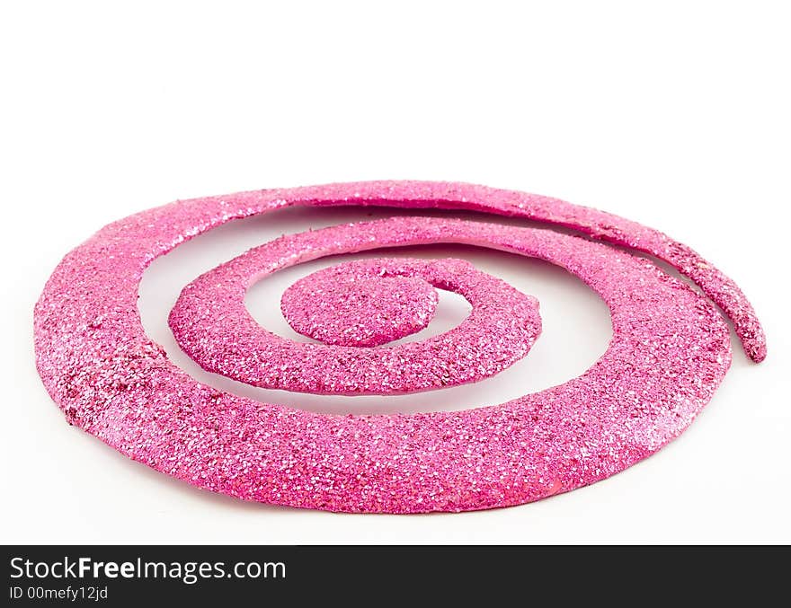 Pink glittering spiral ornament isolated on white background