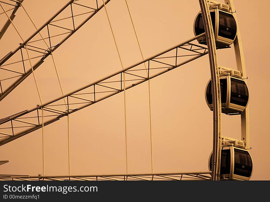 Ferris wheel close up sepia