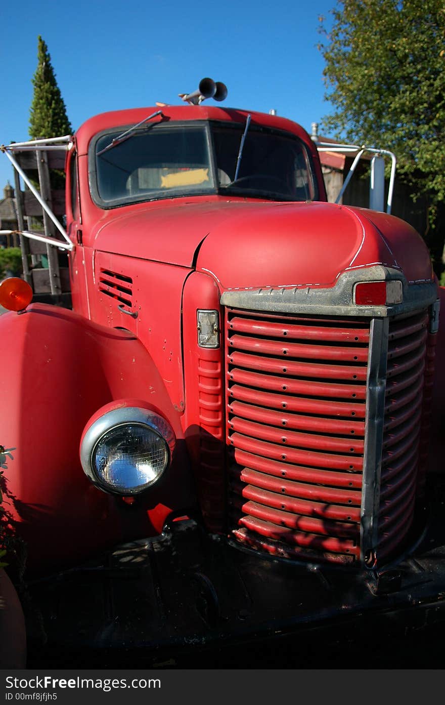 Old red vintage truck front