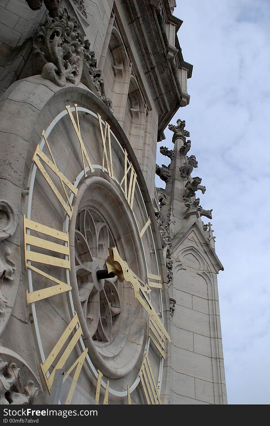 Ornamental clock on a town hall. Ornamental clock on a town hall