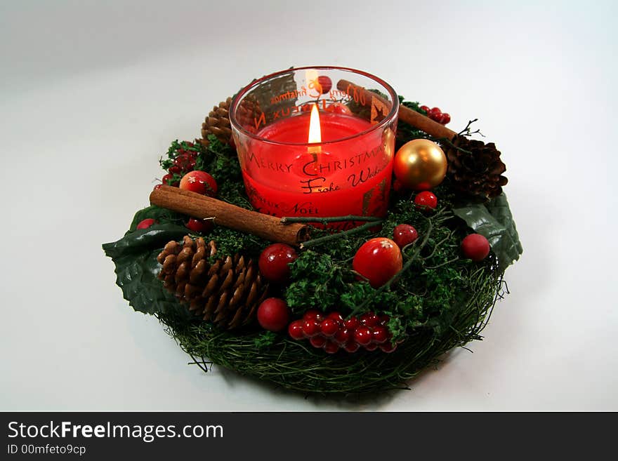 Christmas decoration - advent wreath with candle isolated on white background