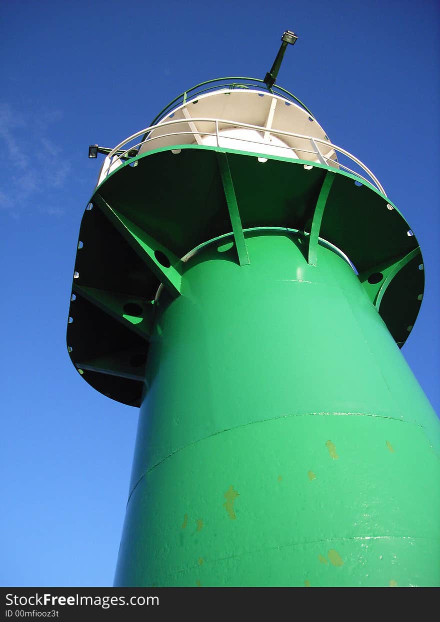 Light house at the port entrance of Rostock / Warnemunde. Light house at the port entrance of Rostock / Warnemunde