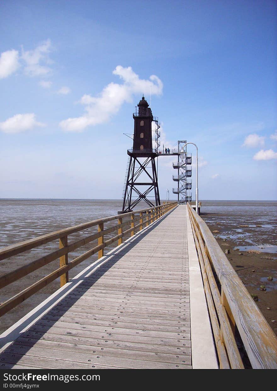 Light house in the wadden sea in the German North Sea. Light house in the wadden sea in the German North Sea