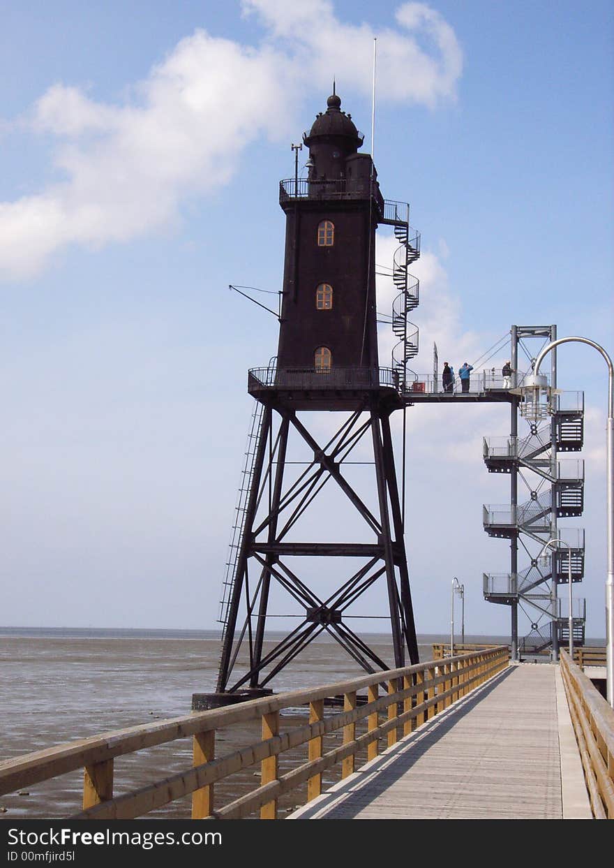 Light house in the wadden sea in the German North Sea. Light house in the wadden sea in the German North Sea