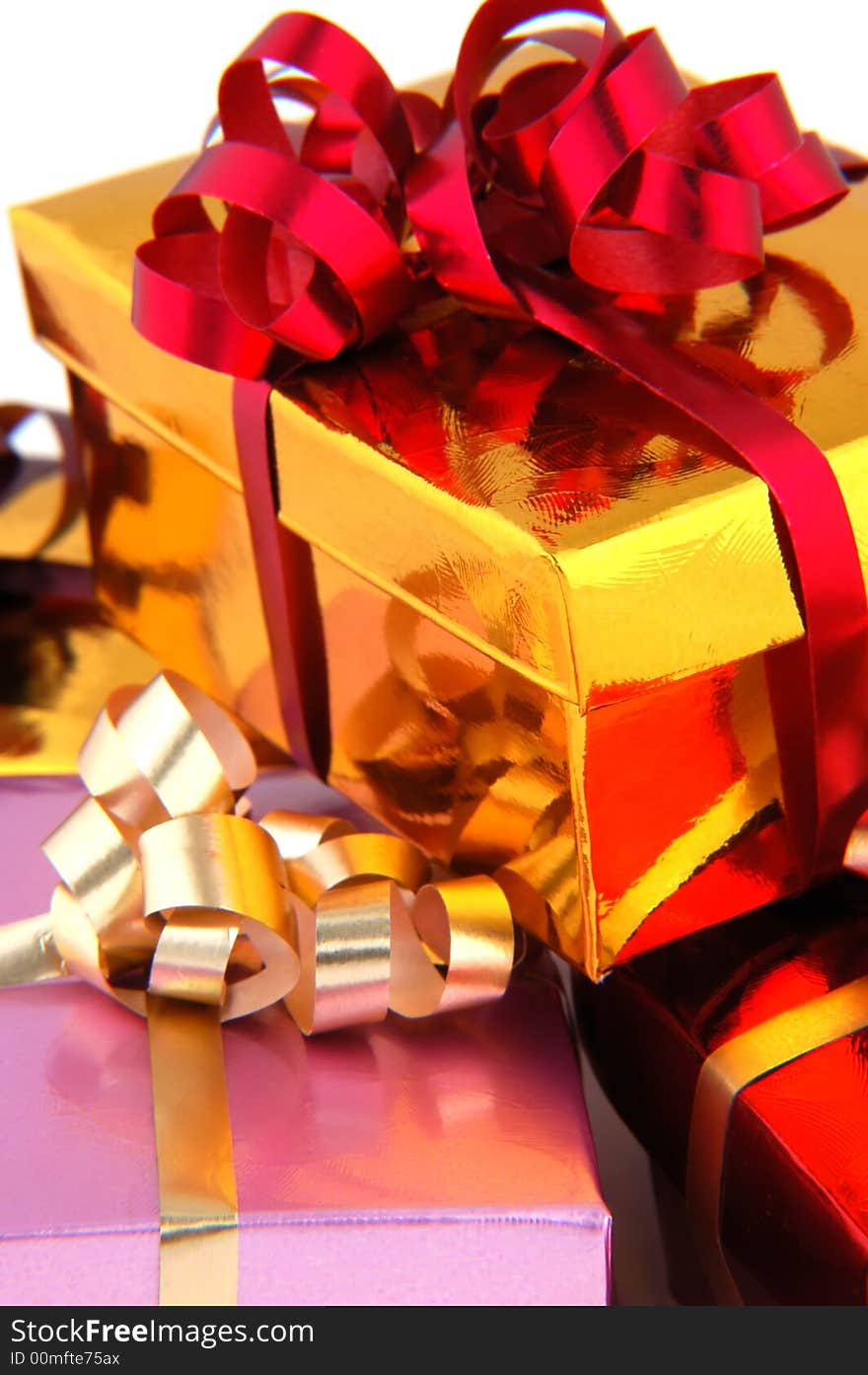 Christmas gifts wrapped with colorful ribbons