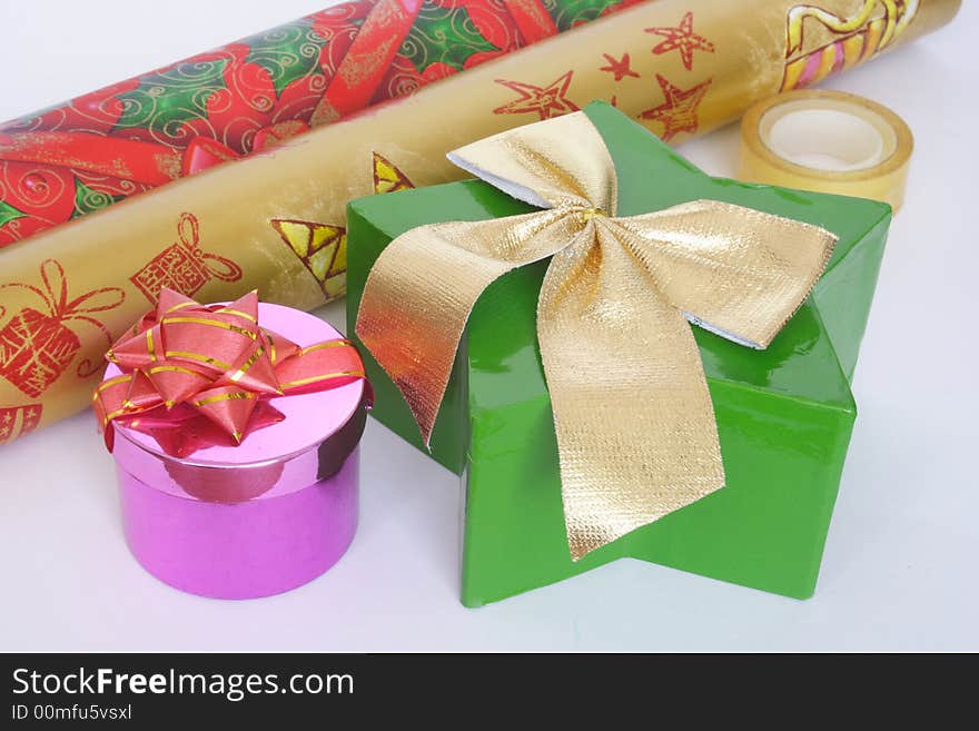 Paper and tape to prepare the Christmas presents