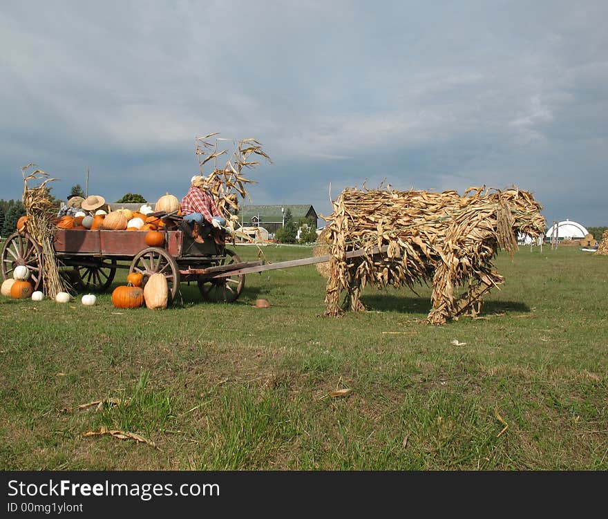 A wagon made up of many materials from the materials of the fall harvest. A wagon made up of many materials from the materials of the fall harvest.