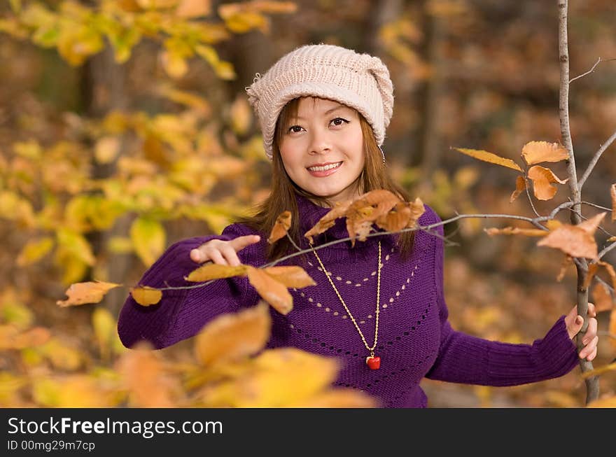 A girl wandering in woods in deep autumn. A girl wandering in woods in deep autumn