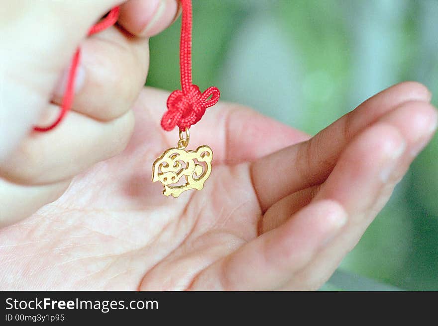 It is a gold pig with chinese knot. a chinese style gife,
See more my images at :) http://www.dreamstime.com/Eprom_info. It is a gold pig with chinese knot. a chinese style gife,
See more my images at :) http://www.dreamstime.com/Eprom_info