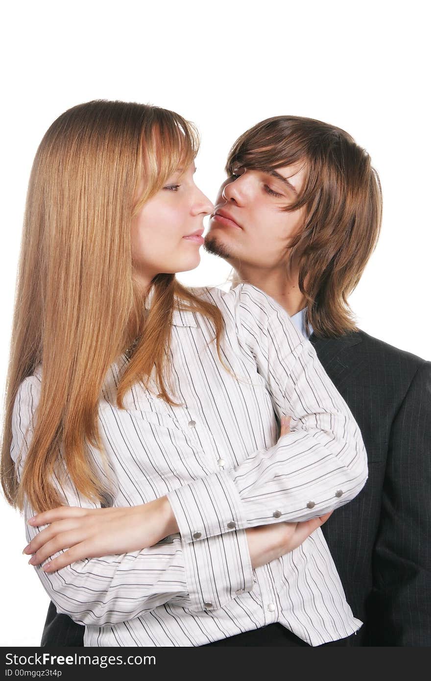 Attractive young couple isolated over white background