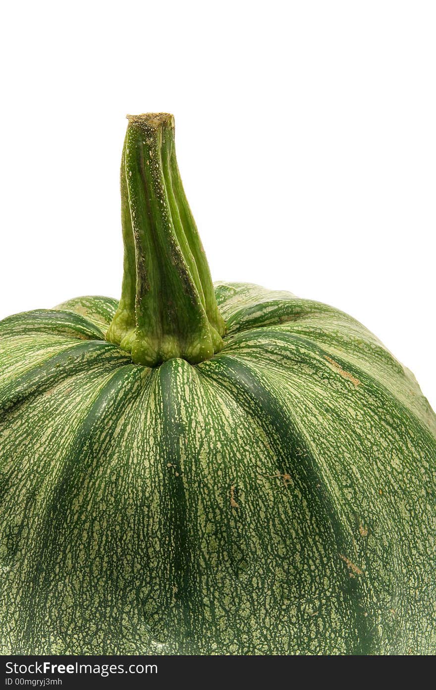 Green ripe pumpkin close-up isolated over a white background