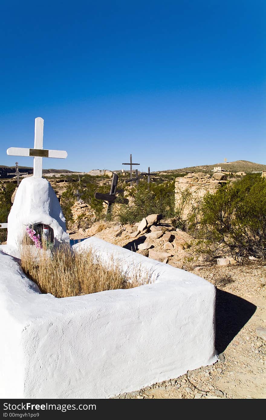 One recently tended to tomb amongst many old abondoned gravesites. One recently tended to tomb amongst many old abondoned gravesites.