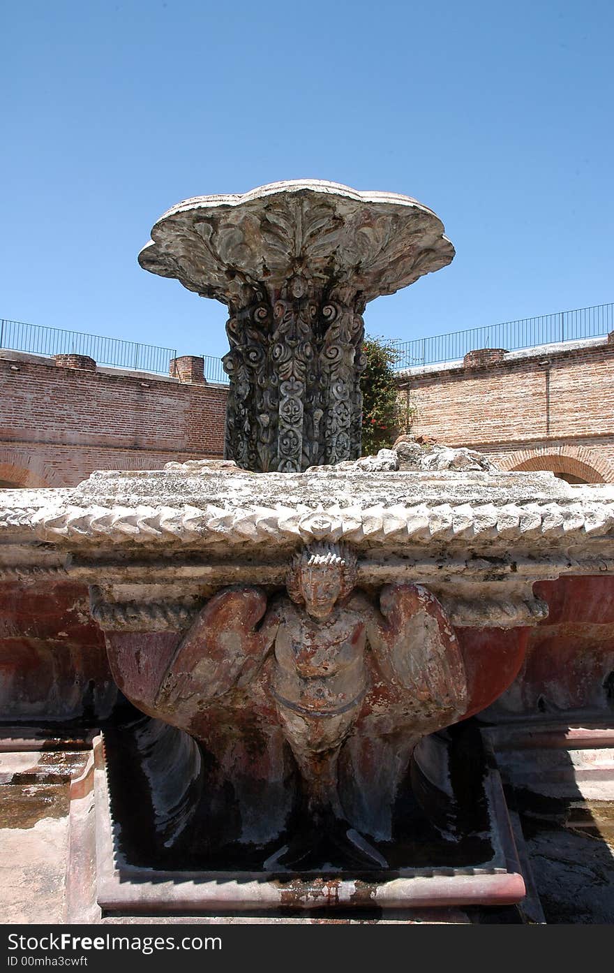 A fountain in a square in Antigua, Guatemala. A fountain in a square in Antigua, Guatemala