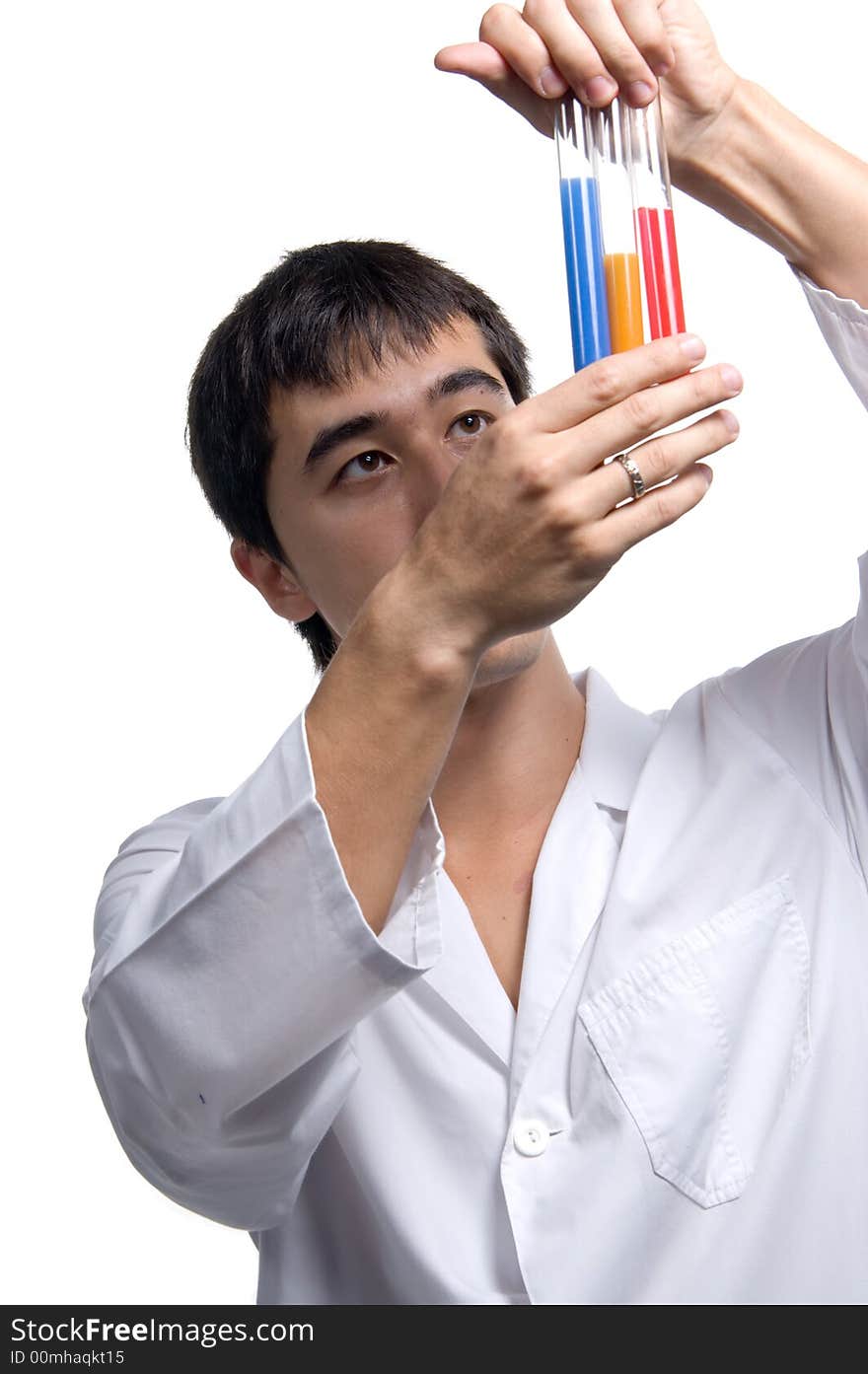 A doctor and test-tubes with multicolored liquid