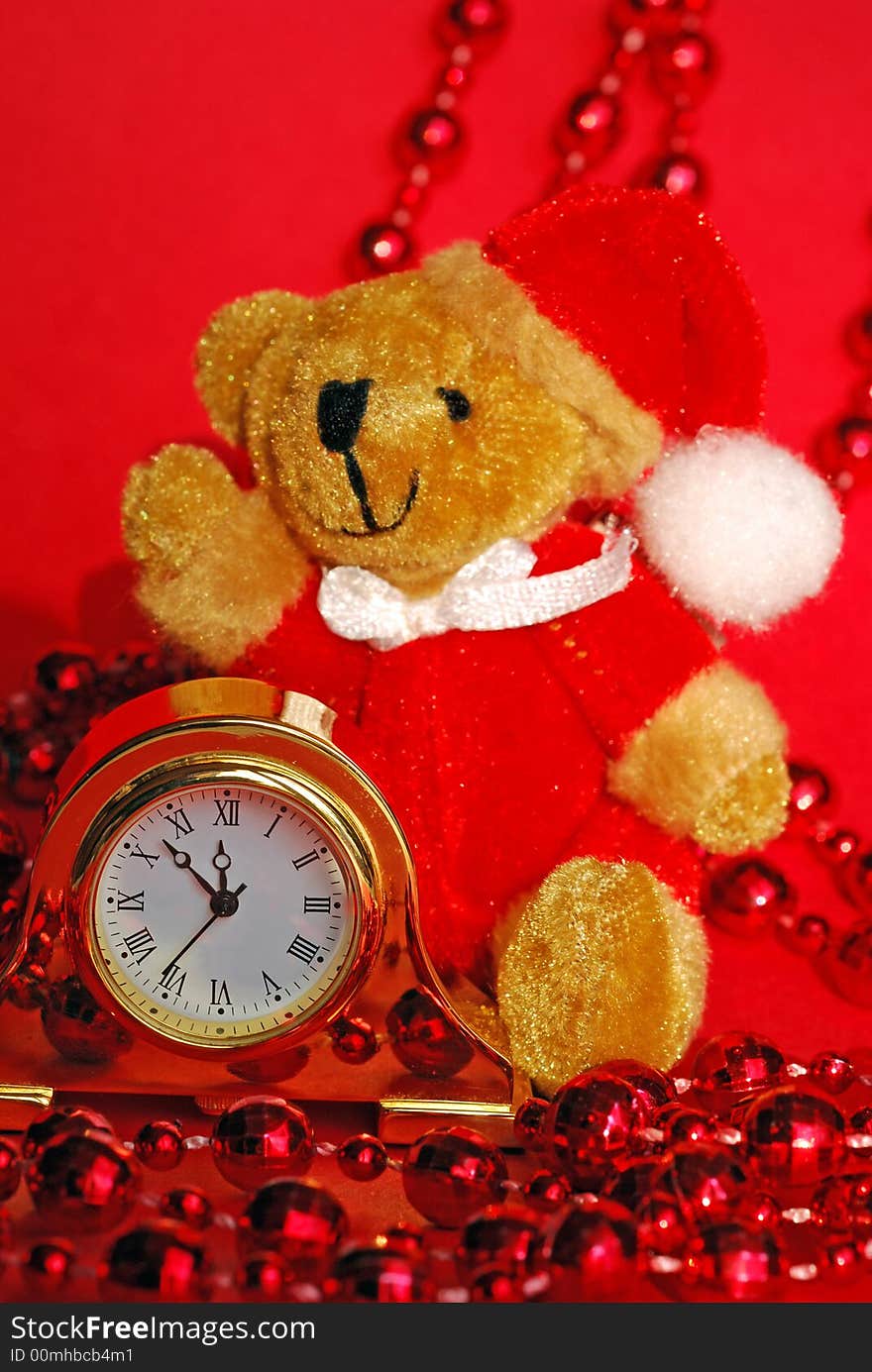 Clock, toy - bear and christmas decorations. Clock, toy - bear and christmas decorations.