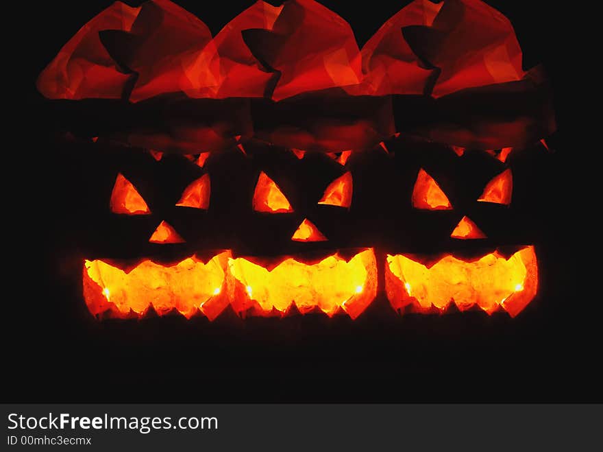 Pumpkins with black background at halloween dag