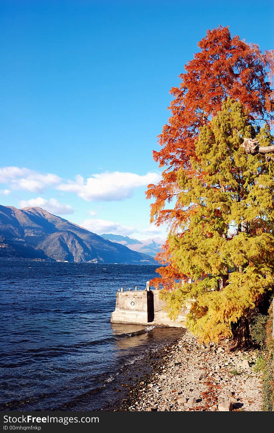 Lake landscape in fall season, Como Lake, Italy. Lake landscape in fall season, Como Lake, Italy