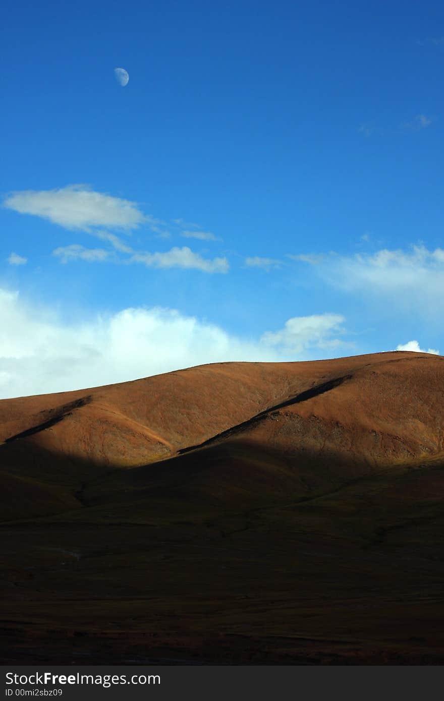 Moon hang in the aire on prairie on the north of tibet. Moon hang in the aire on prairie on the north of tibet.