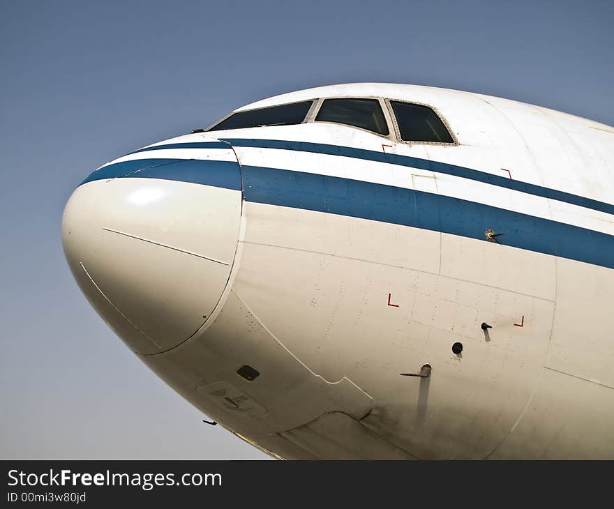 Front of an chinese aircraft waiting at the airport