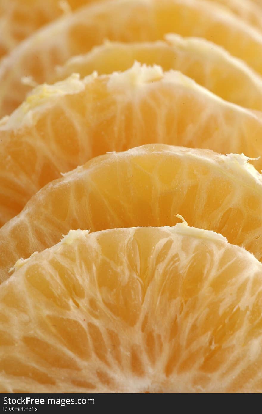 Slices of delicious and fresh tangerine. Slices of delicious and fresh tangerine