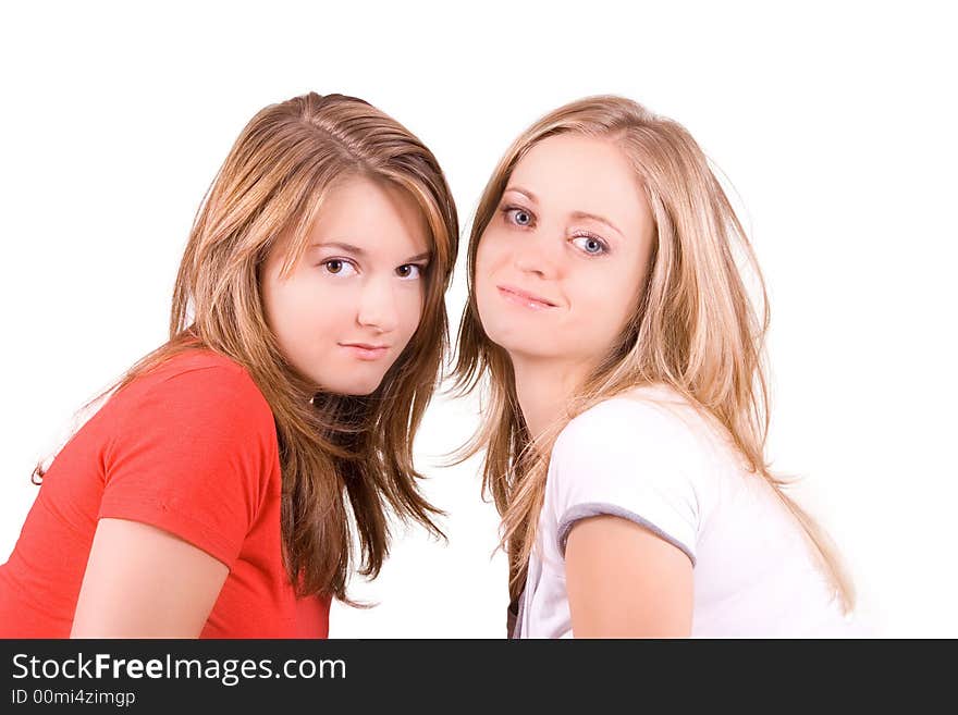 Two girls smiling isolated on white