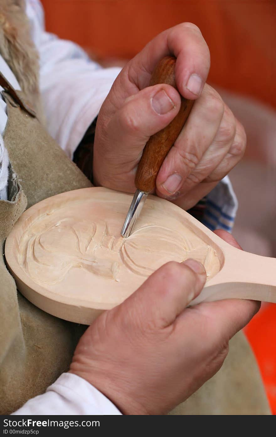 Woodcutter´s hands working with chisel. Woodcutter´s hands working with chisel