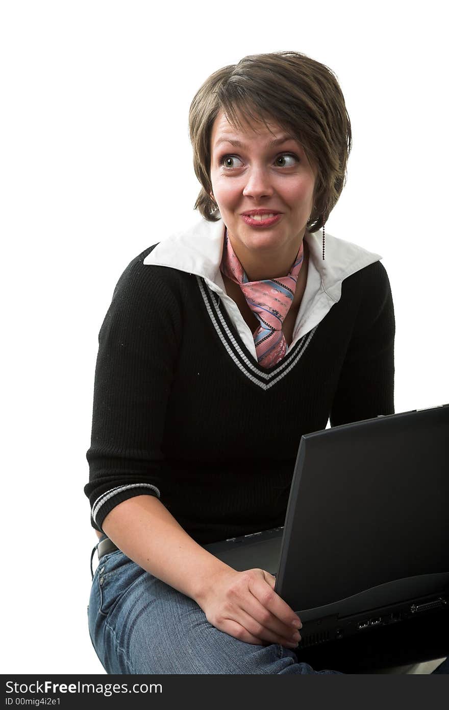 Confused girl with laptop isolated on white