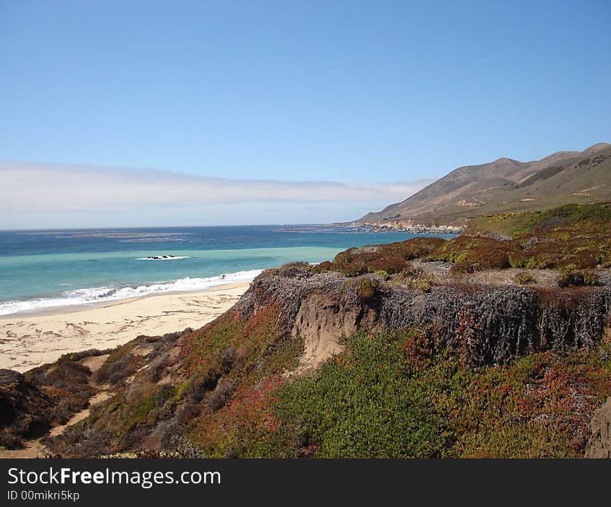 The picture of Pacific Ocean taken from Coastal Highway in California. The picture of Pacific Ocean taken from Coastal Highway in California.