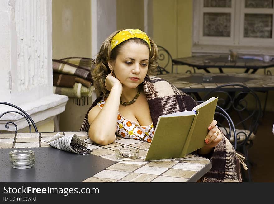 Beautiful woman with book